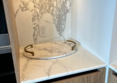 A marble counter top with a round object on it.